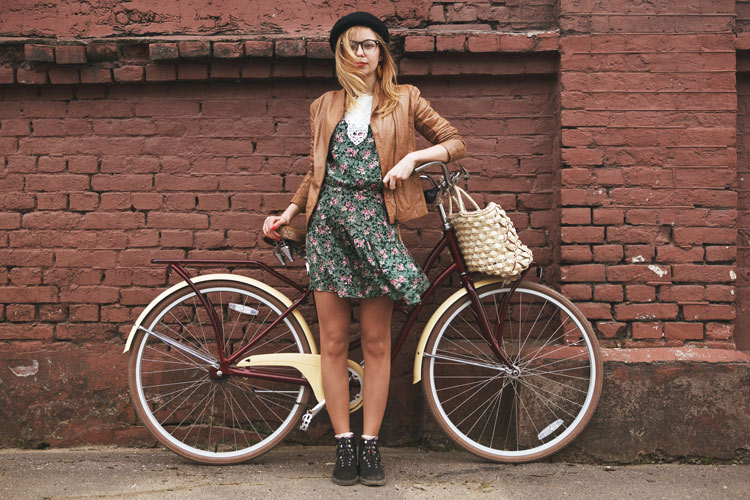 starting image of woman and bicycle