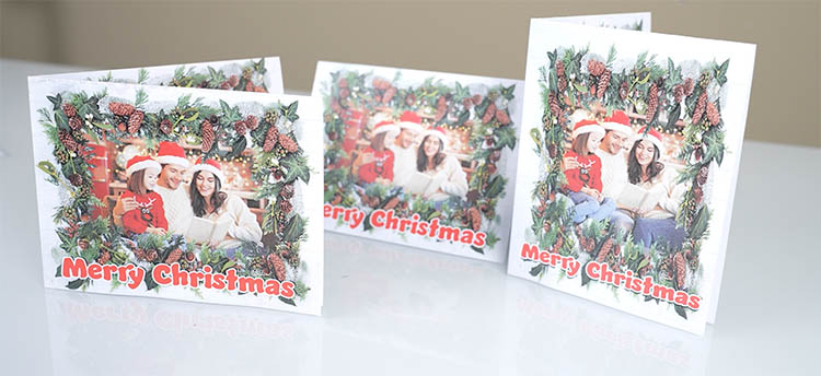 Printed greeting card mockup folded and standing on table