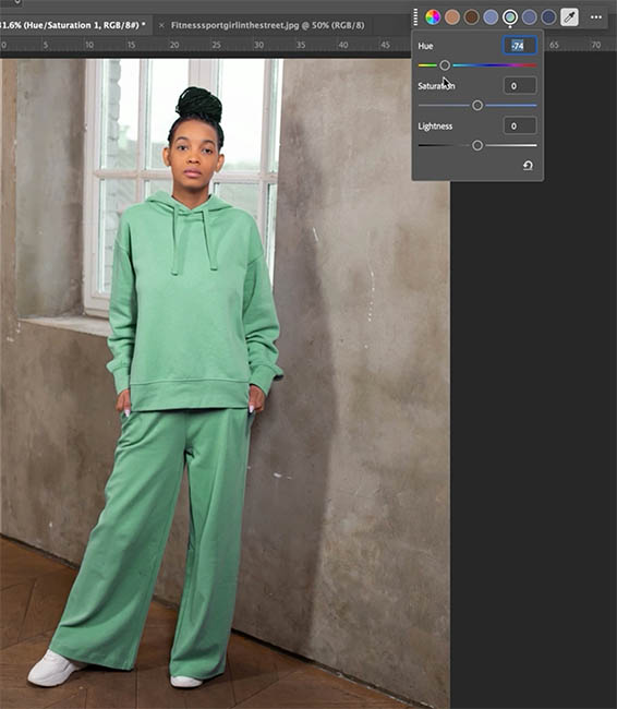 Hoodie and pants changed from blue to green by moving the Hue slider in Adjust colors